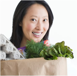 woman holding groceries