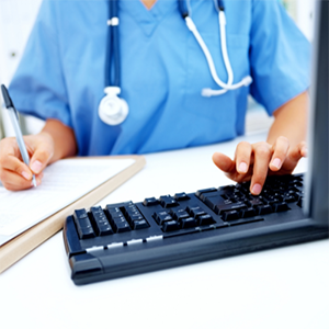 health care professional typing